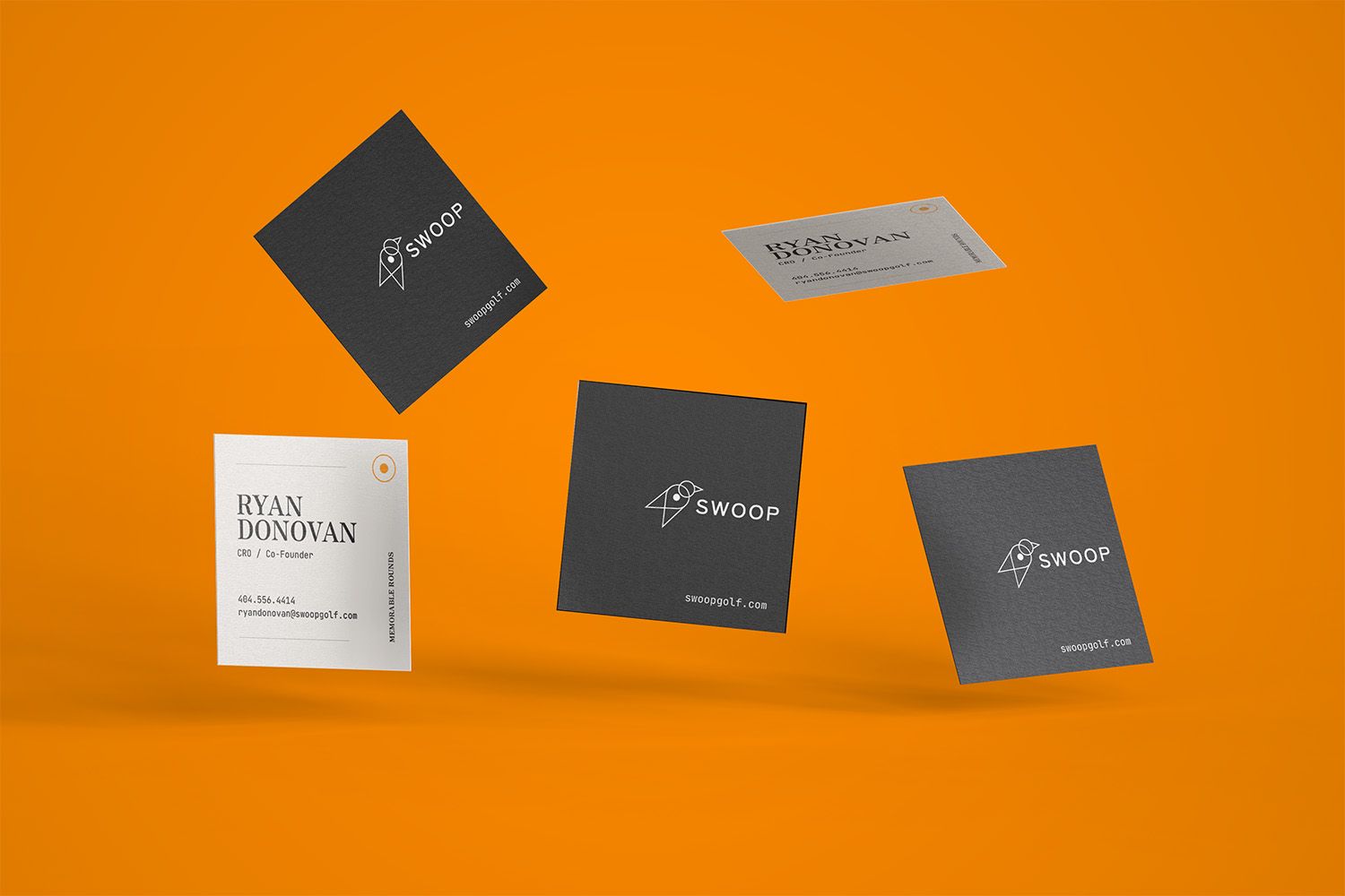 Swoop Business Cards against an orange background
