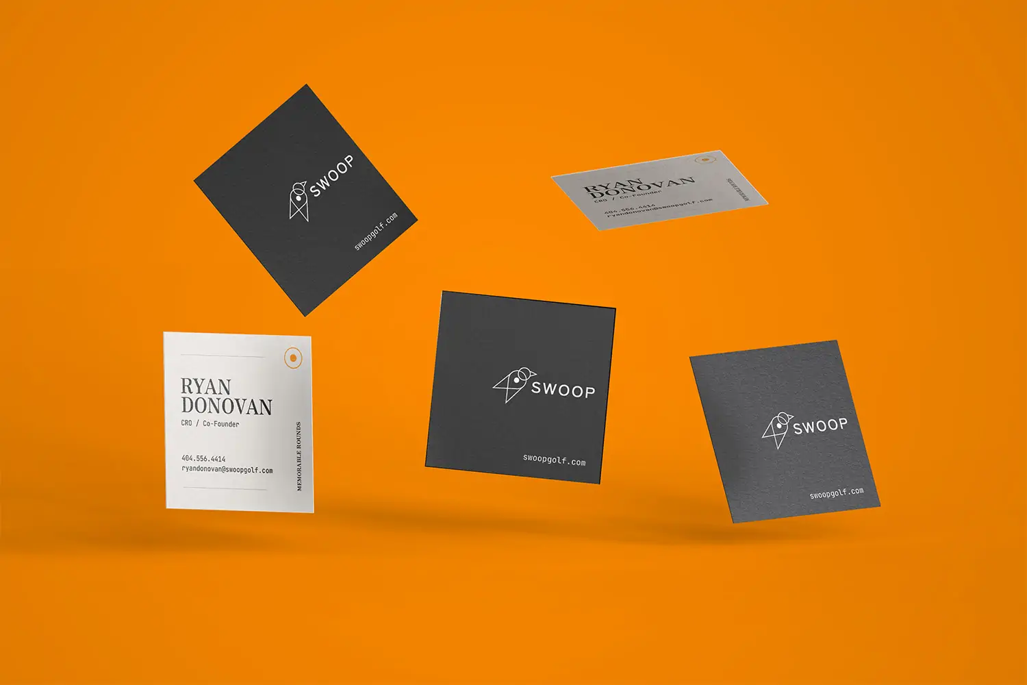 Swoop Business Cards against an orange background