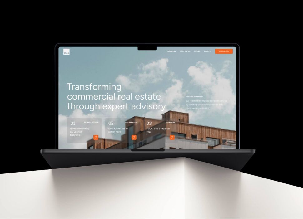 TSCG Real Estate Website Design on Laptop