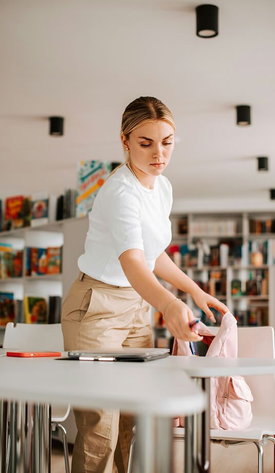 Teacher prepping her classroom